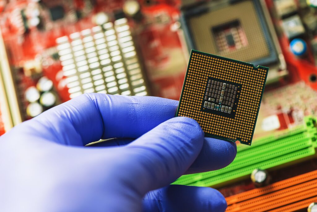 Computer forensics investigator installing old cpu